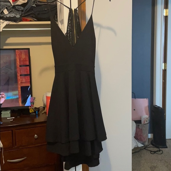 Black dress with open and lace back - Picture 1 of 2